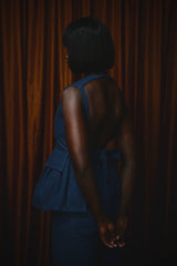 LINCOLN BACKLESS PEPLUM TOP IN VINTAGE DENIM