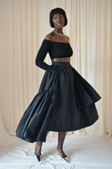 CALAIS ASYMMETRIC WIND BREAKER SKIRT IN BLACK