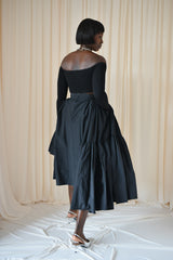 CALAIS ASYMMETRIC WIND BREAKER SKIRT IN BLACK