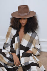 CHRISTOPHER RANCHER IN BROWN