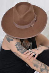 CHRISTOPHER RANCHER IN BROWN