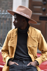 CHRISTOPHER RANCHER IN BROWN