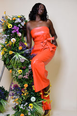 JORDAN WIDE LEG FAUX LEATHER JUMPSUIT IN CORAL