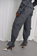MUNICH TIED CUFF JUMPSUIT IN GUNMETAL GREY