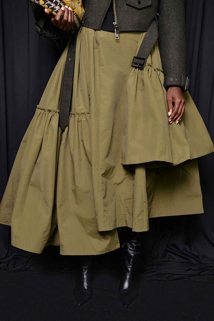 CALAIS ASYMMETRIC WIND BREAKER SKIRT IN GREEN