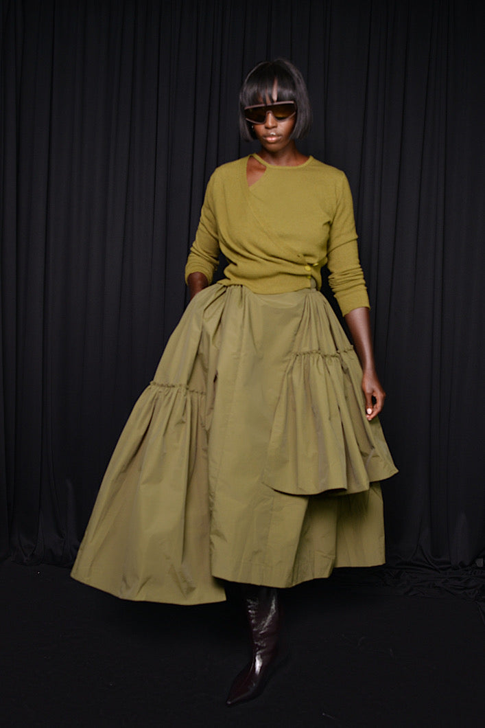 CALAIS ASYMMETRIC WIND BREAKER SKIRT IN GREEN