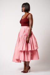 CALAIS ASYMMETRIC WIND BREAKER SKIRT IN PINK