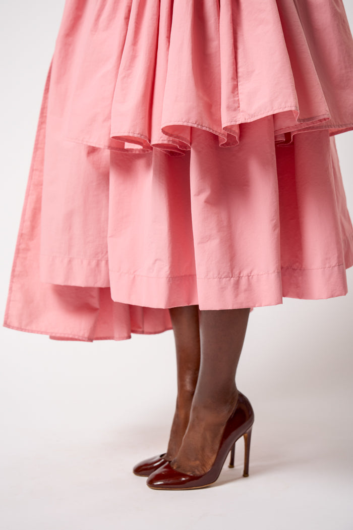CALAIS ASYMMETRIC WIND BREAKER SKIRT IN PINK – THE KEMIST