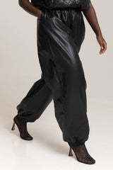GHENT FAUX LEATHER HAREM PANTS IN BLACK