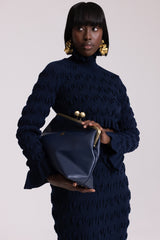 ODENSE LEATHER CLUTCH BAG IN NAVY BLUE