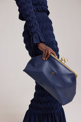 ODENSE LEATHER CLUTCH BAG IN NAVY BLUE