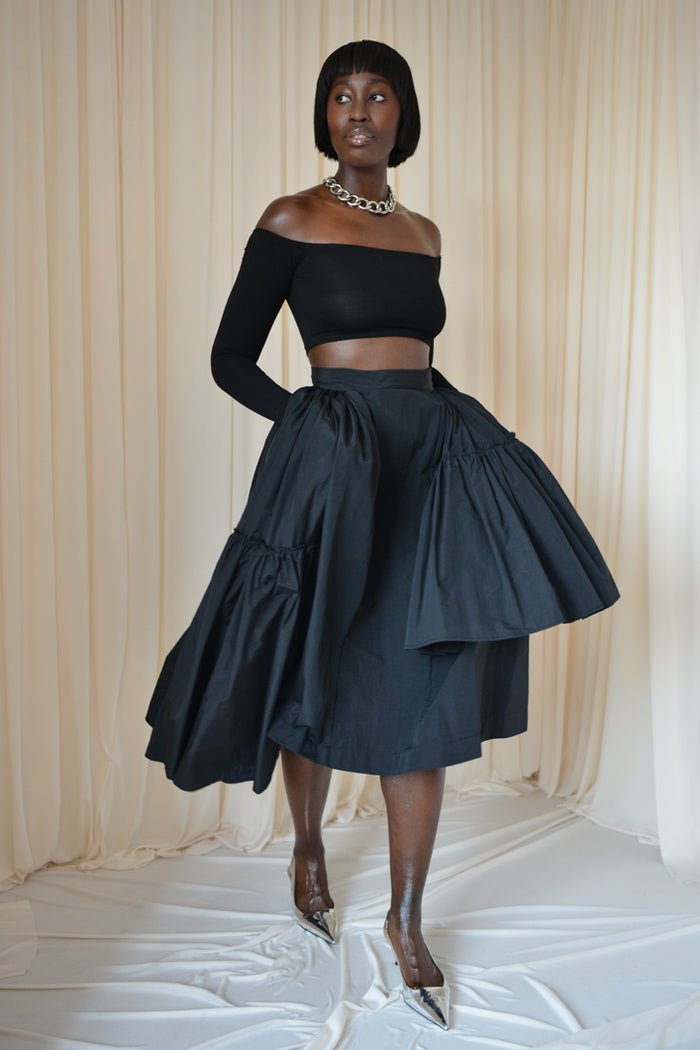 CALAIS ASYMMETRIC WIND BREAKER SKIRT IN BLACK – THE KEMIST