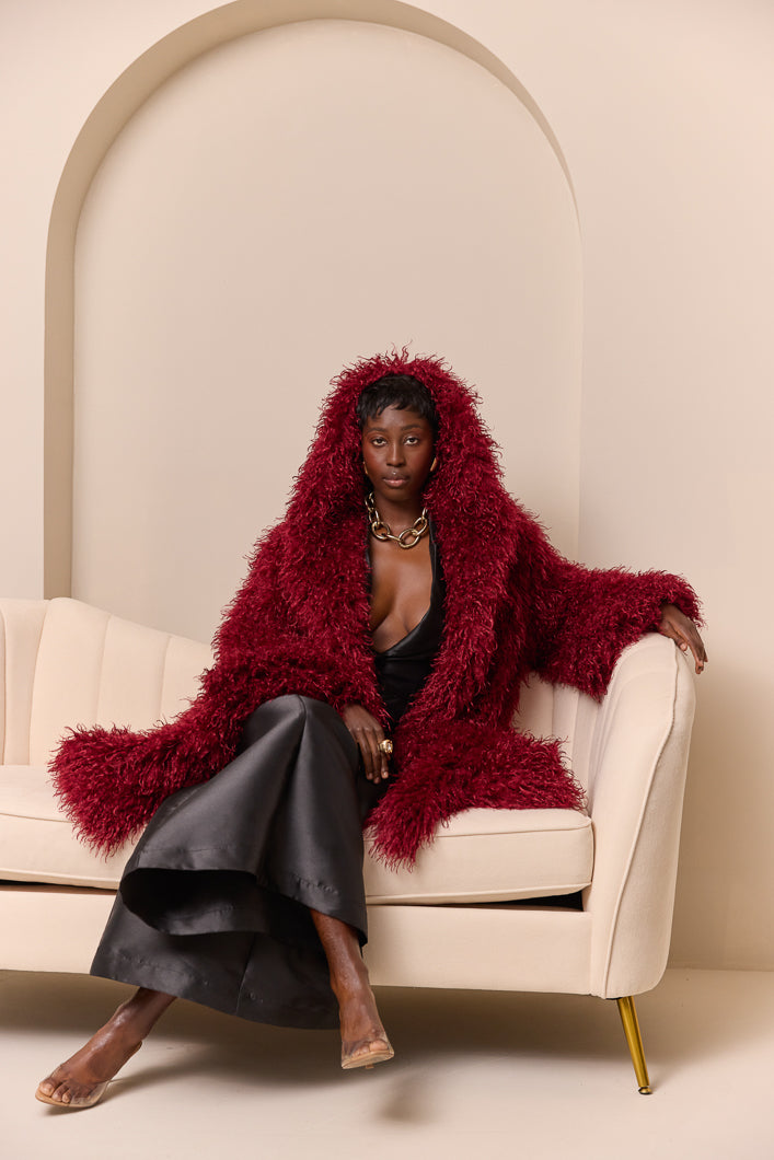RIGA HOODED FAUX FUR COAT IN BURGUNDY