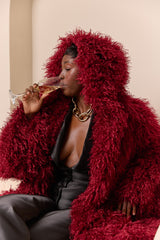 RIGA HOODED FAUX FUR COAT IN BURGUNDY