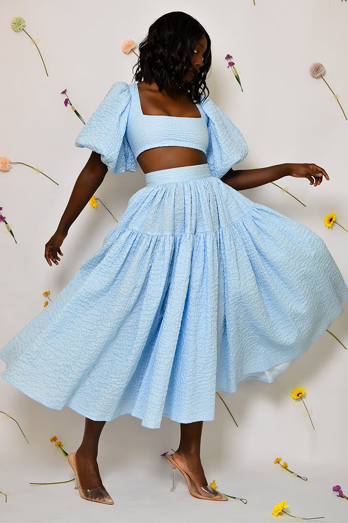 BASTIA PLEATED MIDI SKIRT IN BLUE