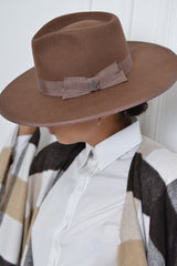 CHRISTOPHER RANCHER IN BROWN