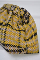 LINCOLN WOOLLEN CLUTCH BAG IN YELLOW